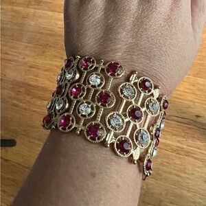 Vintage Costume Cuff Bracelet. Golden with with white and burgundy stones.